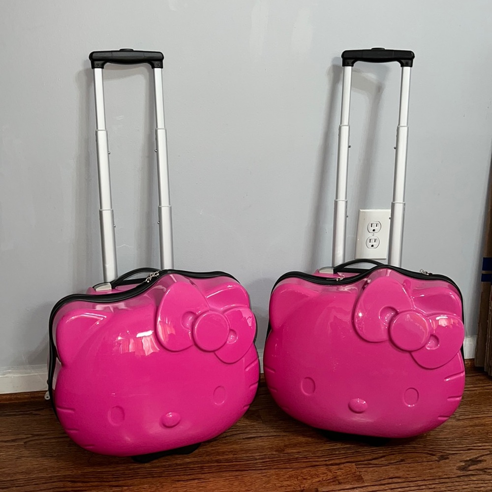 Hello Kitty Hot Pink Hardshell Rolling Suitcases